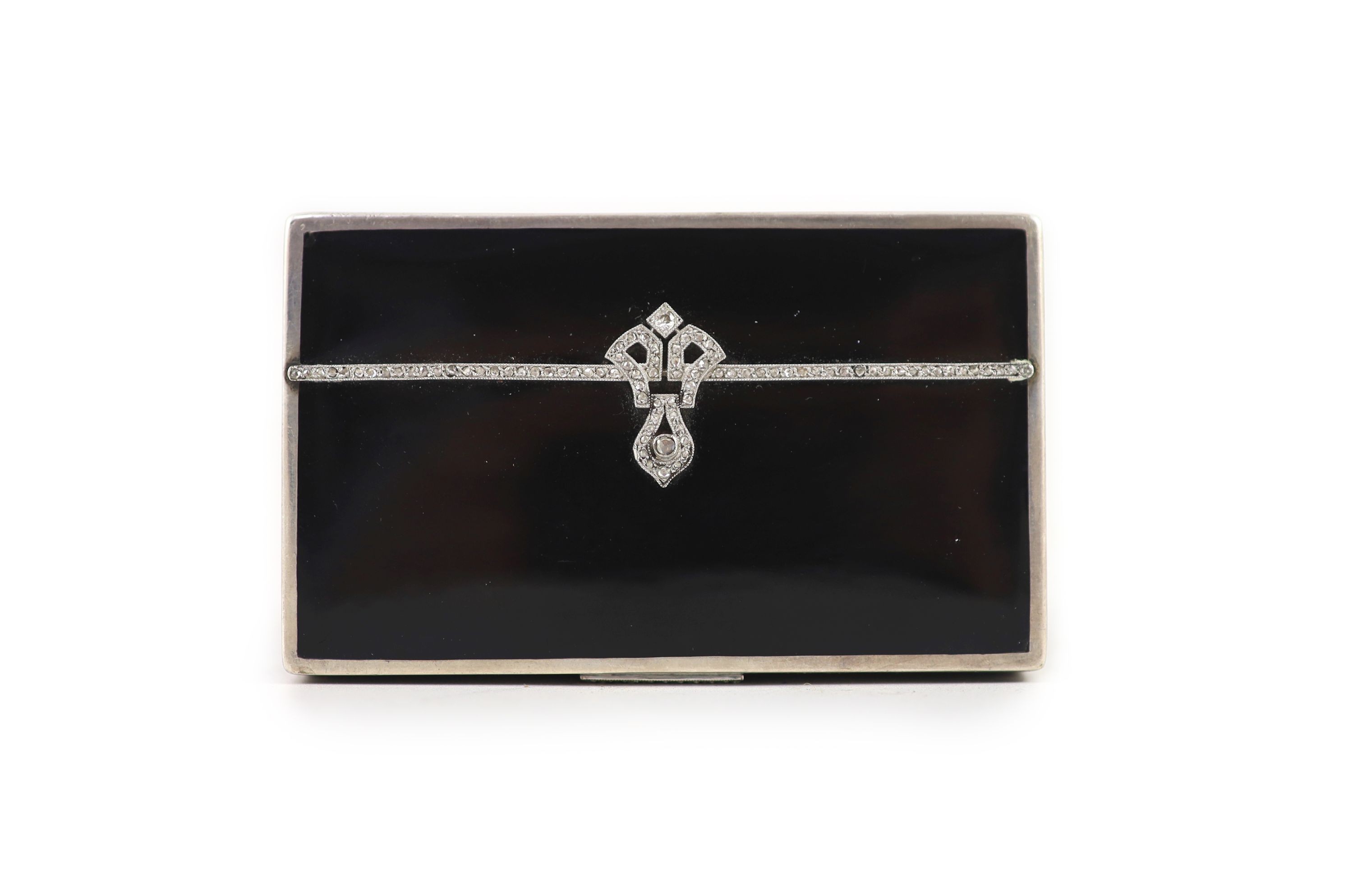 A 1930's silver, black enamel and rose cut diamond set rectangular snuff box, by S.J. Rose & Son